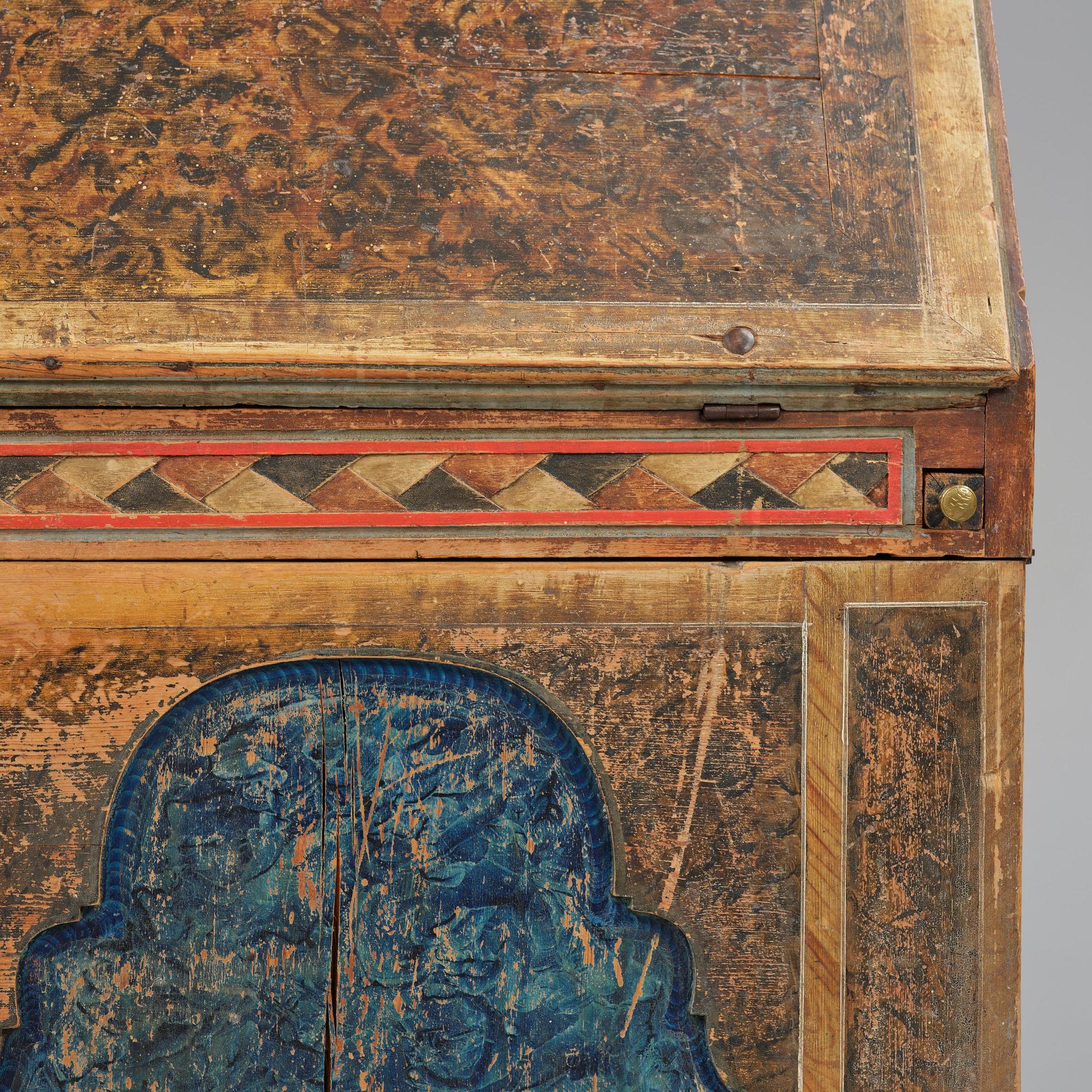 A polychrome-painted folk art cabinet from Värmland, Sweden, dated 1818.