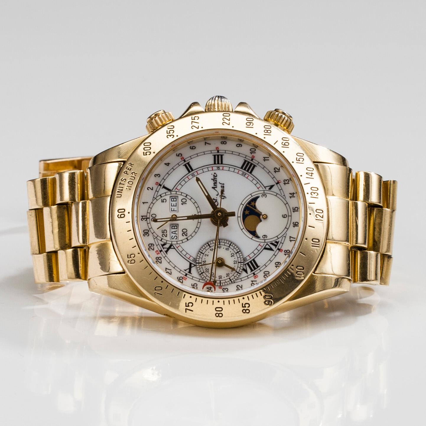 ARMBANDSUR, herr. St, André Graal. 18K guld. Vikt tot. 155,7 g.