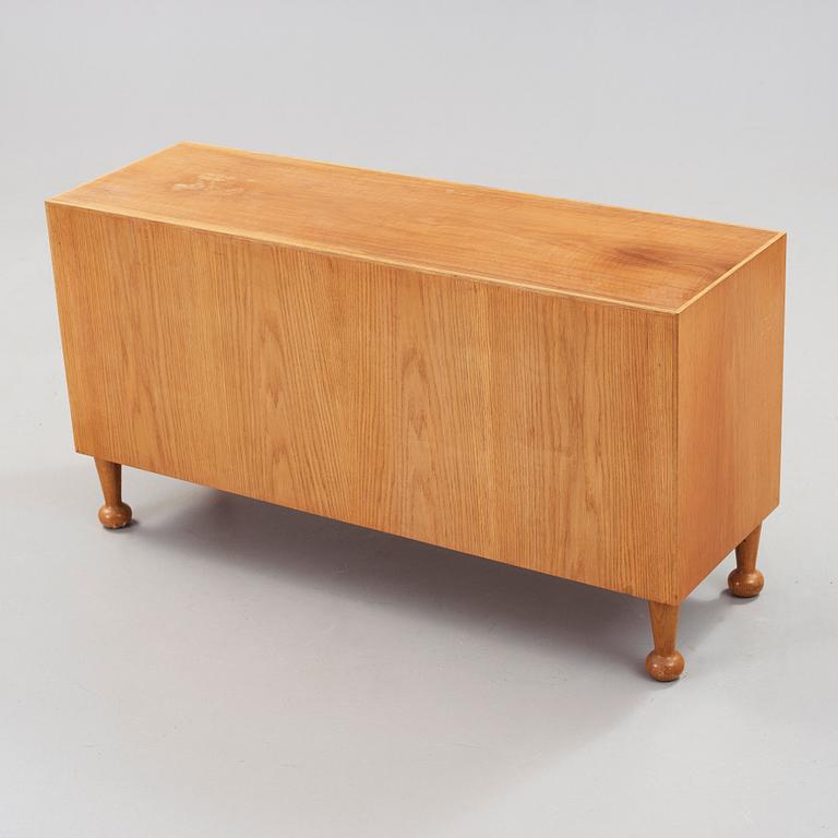 Josef Frank, an elm and mahogany sideboard, Svenskt Tenn, model 727, probably 1960's.