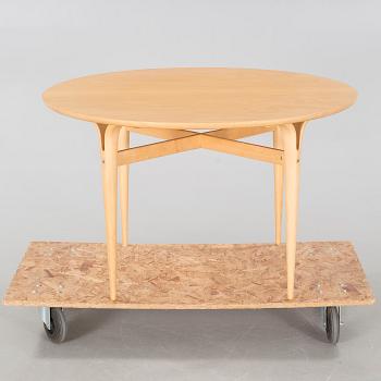a coffee table from Firma Karl Mathsson, Värnamo, dated 1986.