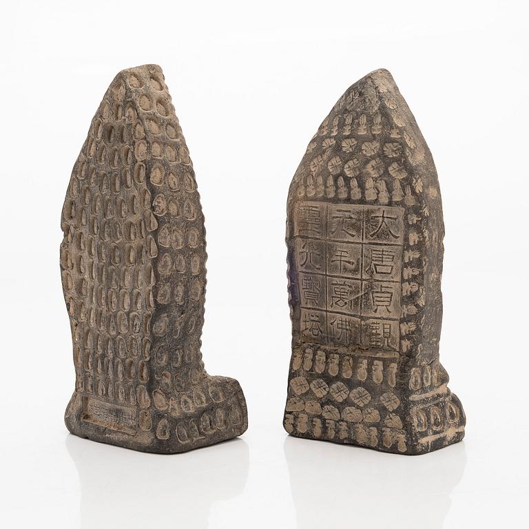 Two steles/tsa tsas, presumably circa 1900.