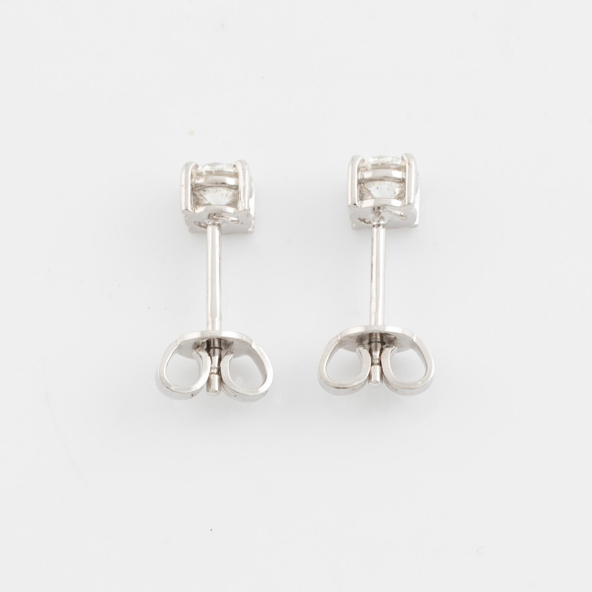 Brilliant cut diamond stud earrings.