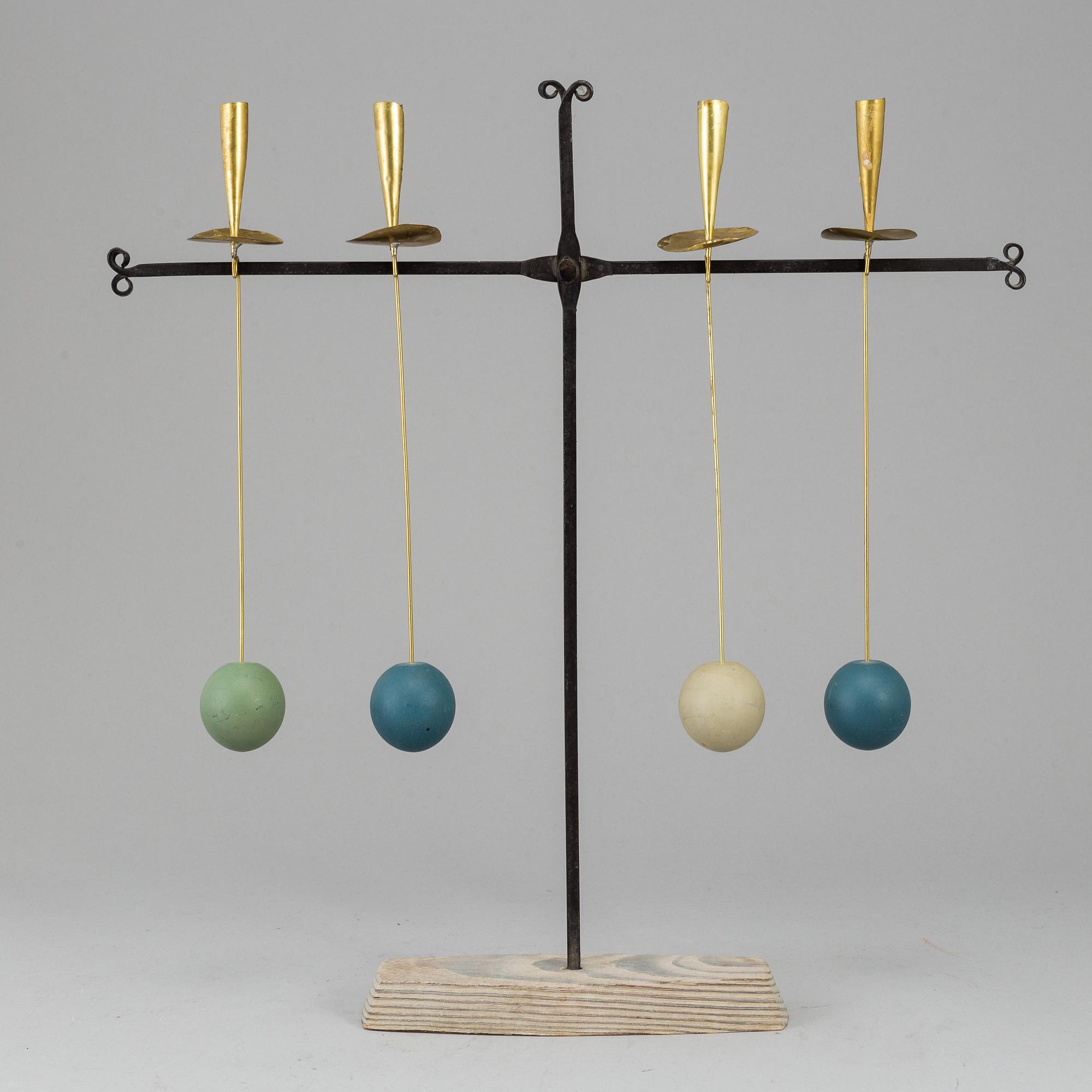 THOMAS HELLSTRÖM, a wrought iron and brass candelabrum from THO Hantverk Rättvik, Bleckogården, 1950's.