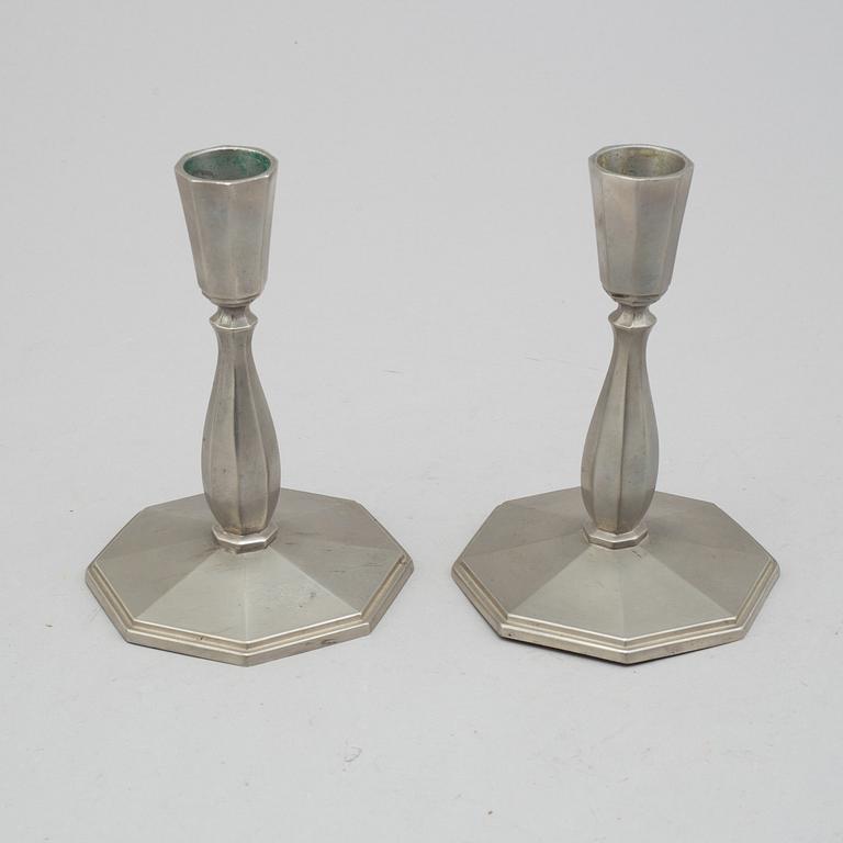 a pair of Art Déco pewter candlesticks by C G Hallberg 1933.