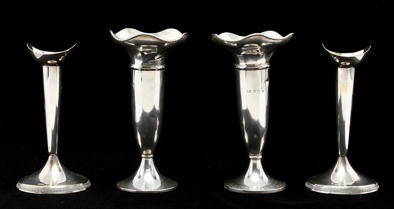 VASER, ett par, samt LJUSSTAKAR, ett par, silver, 1900-tal.