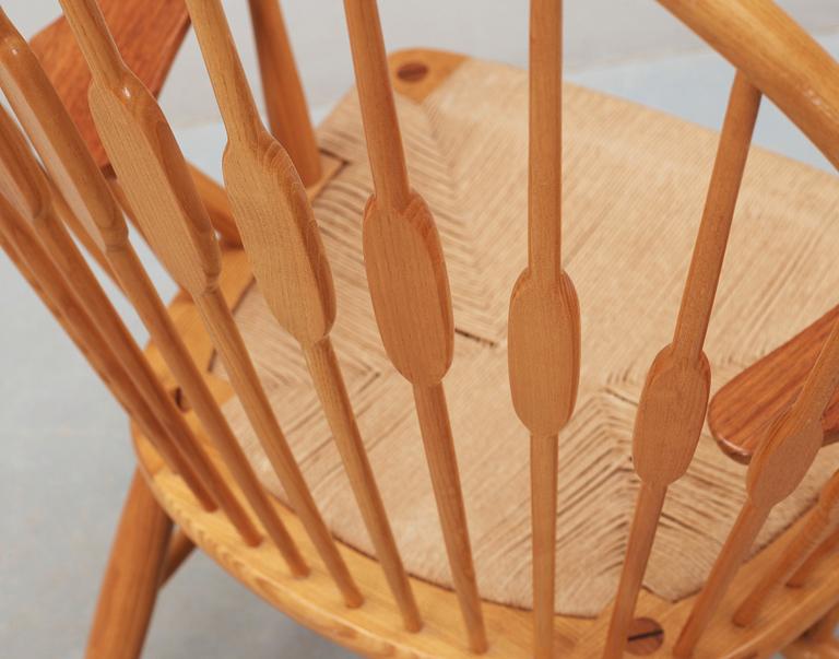 A Hans J Wegner ash and teak 'Peacock chair', Johannes Hansen, Denmark.