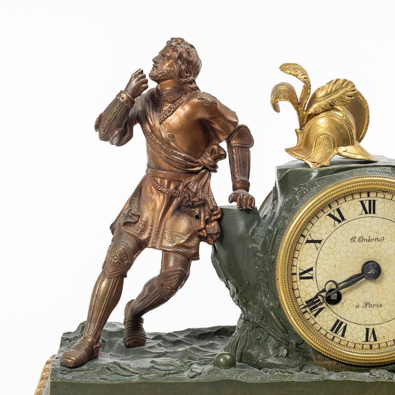 A mantel clock, France, early 20th Century.