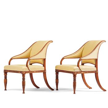 76. A pair of late gustavian armchairs in the manner of Ephraim Ståhl, Stockholm, circa 1800.
