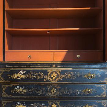 An early 18th century Chinese style cupboard.