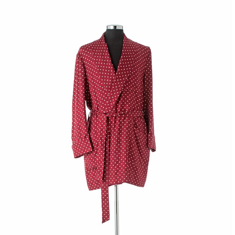 EDSOR KRONEN, a burgundy red and white polka dotted dressing gown.