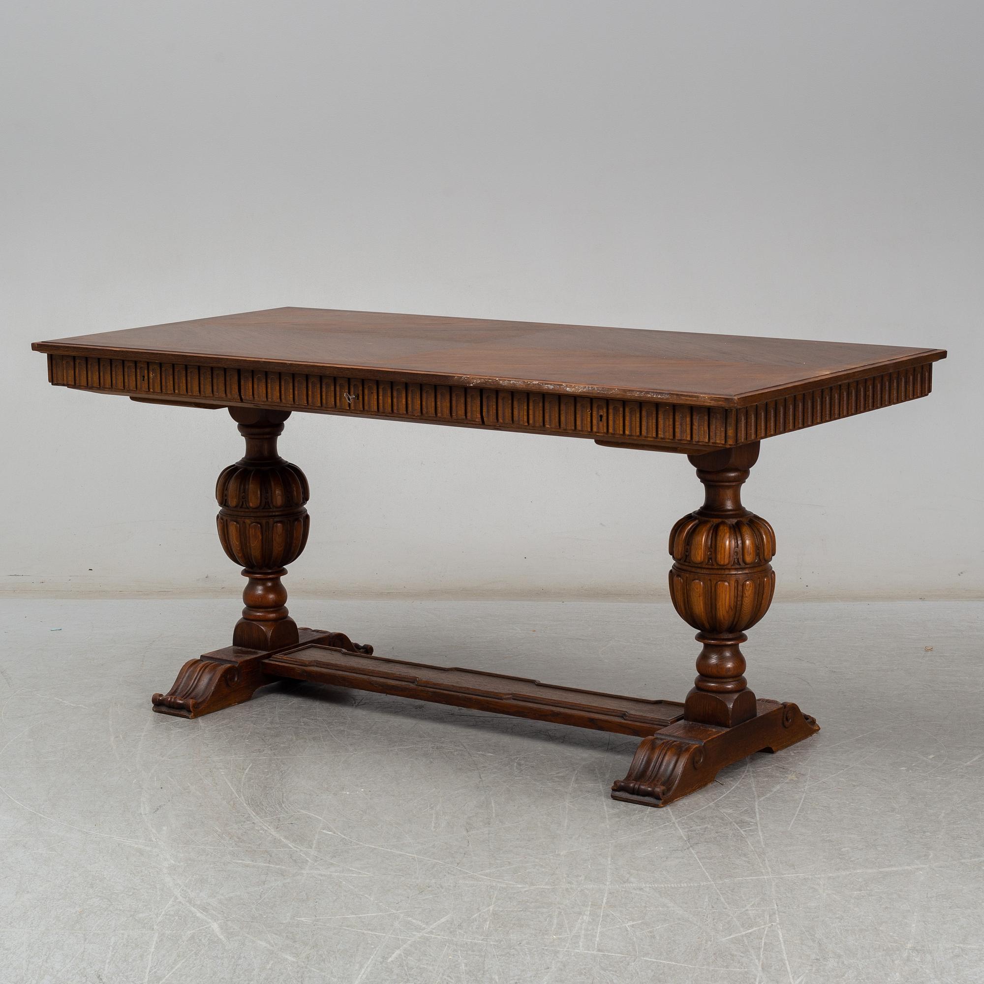 AXEL EINAR HJORTH, an 'Charles' oak table, from Nordiska Kompaniet, 1920s.