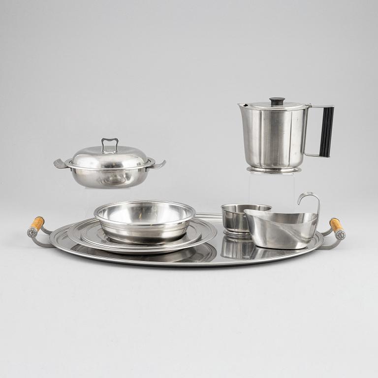 Eight stainless steal pieces to the 'Thebe' cutlry/dining service, Folke Arström, Gense, 1950's/60's.