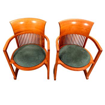 Frank Lloyd Wright, a pair of Barrel chairs model no 606 for Cassina numbered and dated 1986.