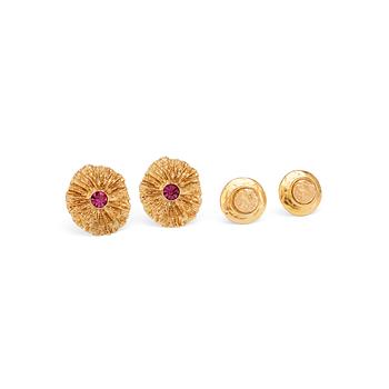 YVES SAINT LAURENT, two pairs of gold colored earclips.