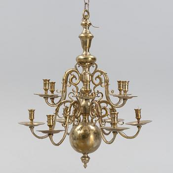 A brass Baroque style chandelier, 20th Century.