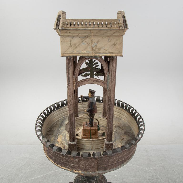 A painted and richly decorated plate garden fountain, late 19th century.