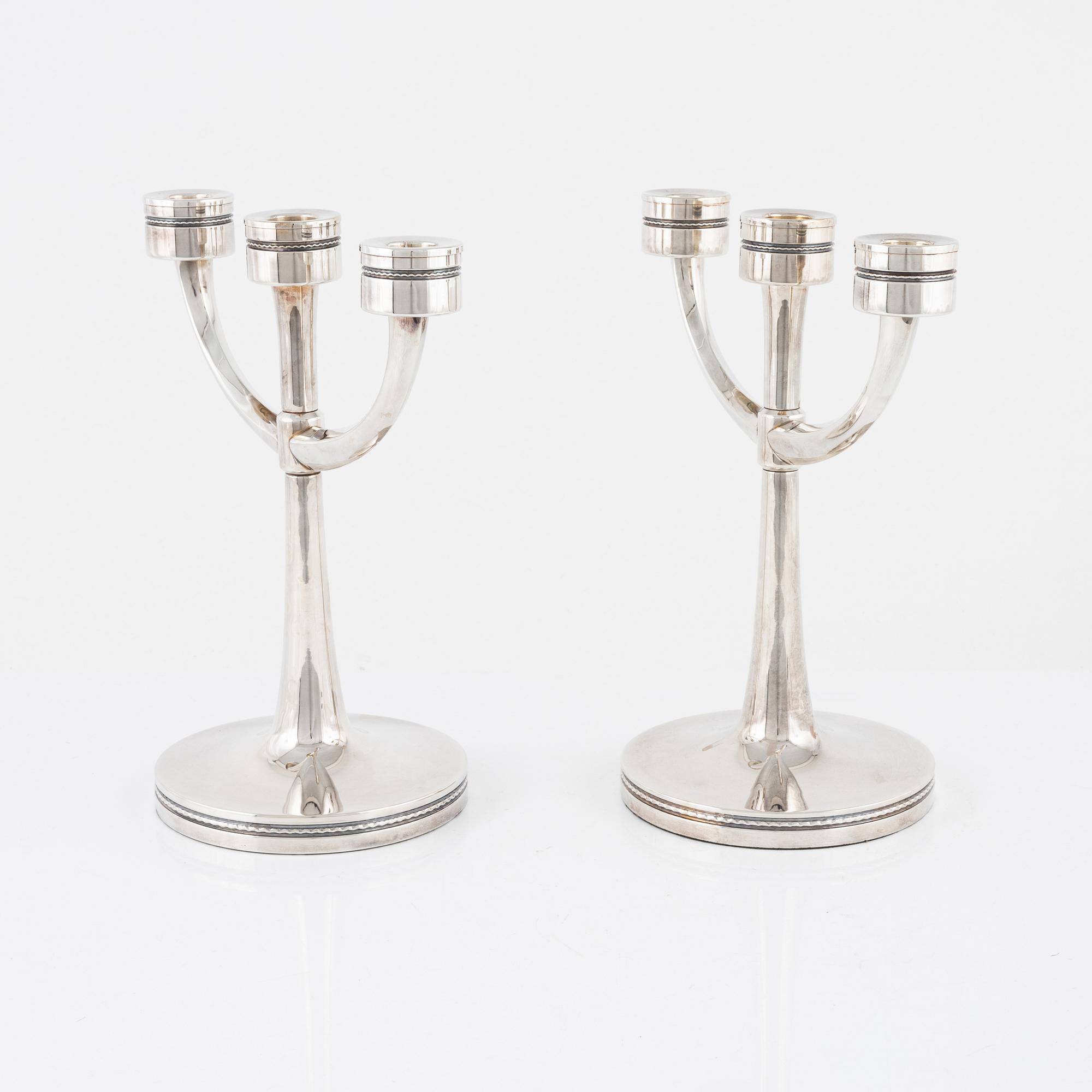 Eric Löfman, kandelabrar, ett par silver, MGAB, Uppsala, 1978-79.