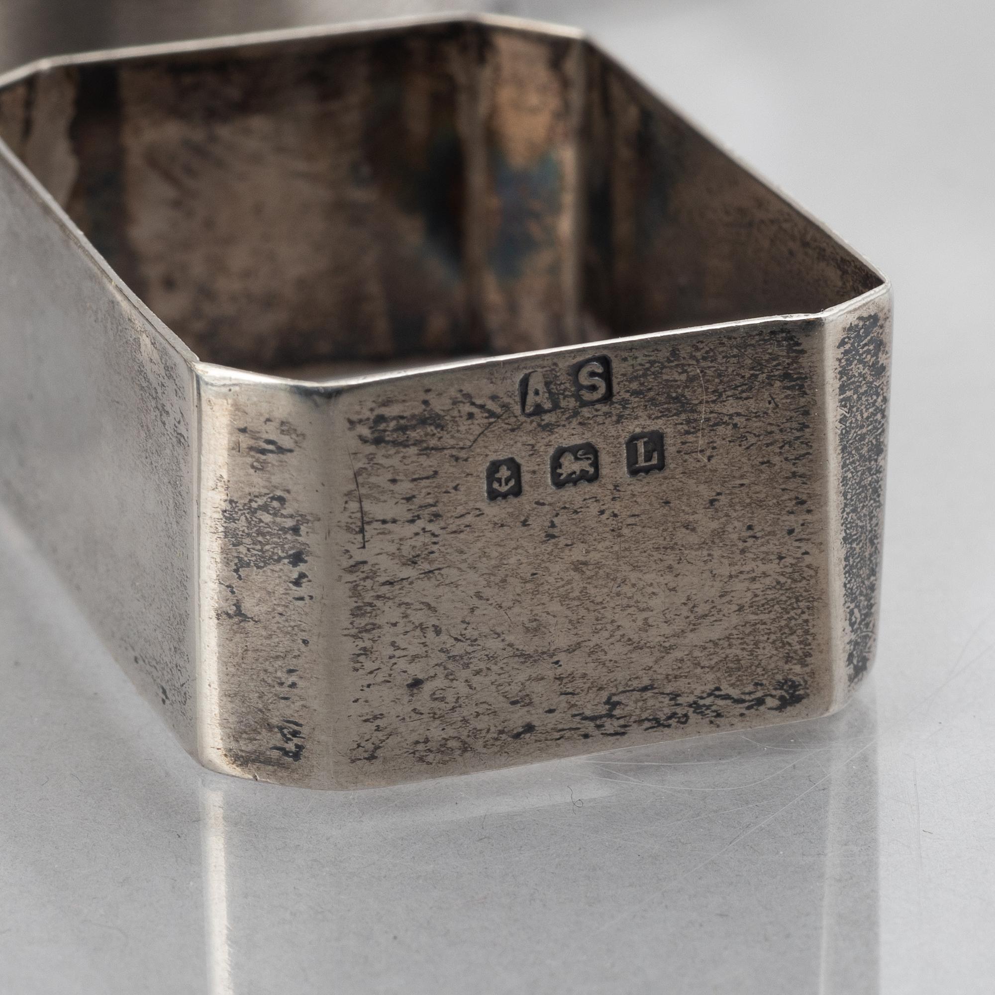 A collection of silver napkin rings, mostly England, Denmark (46 pieces).