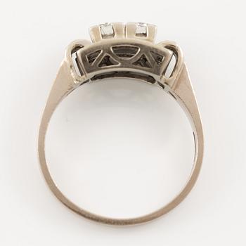 Ring in 18K white gold set with round brilliant-cut and eight-cut diamonds.