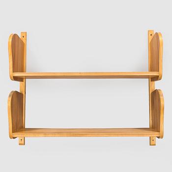 A mid-20th century 'Poika' wall shelf by HMN Huonekaluliike Mikko Nupponen.