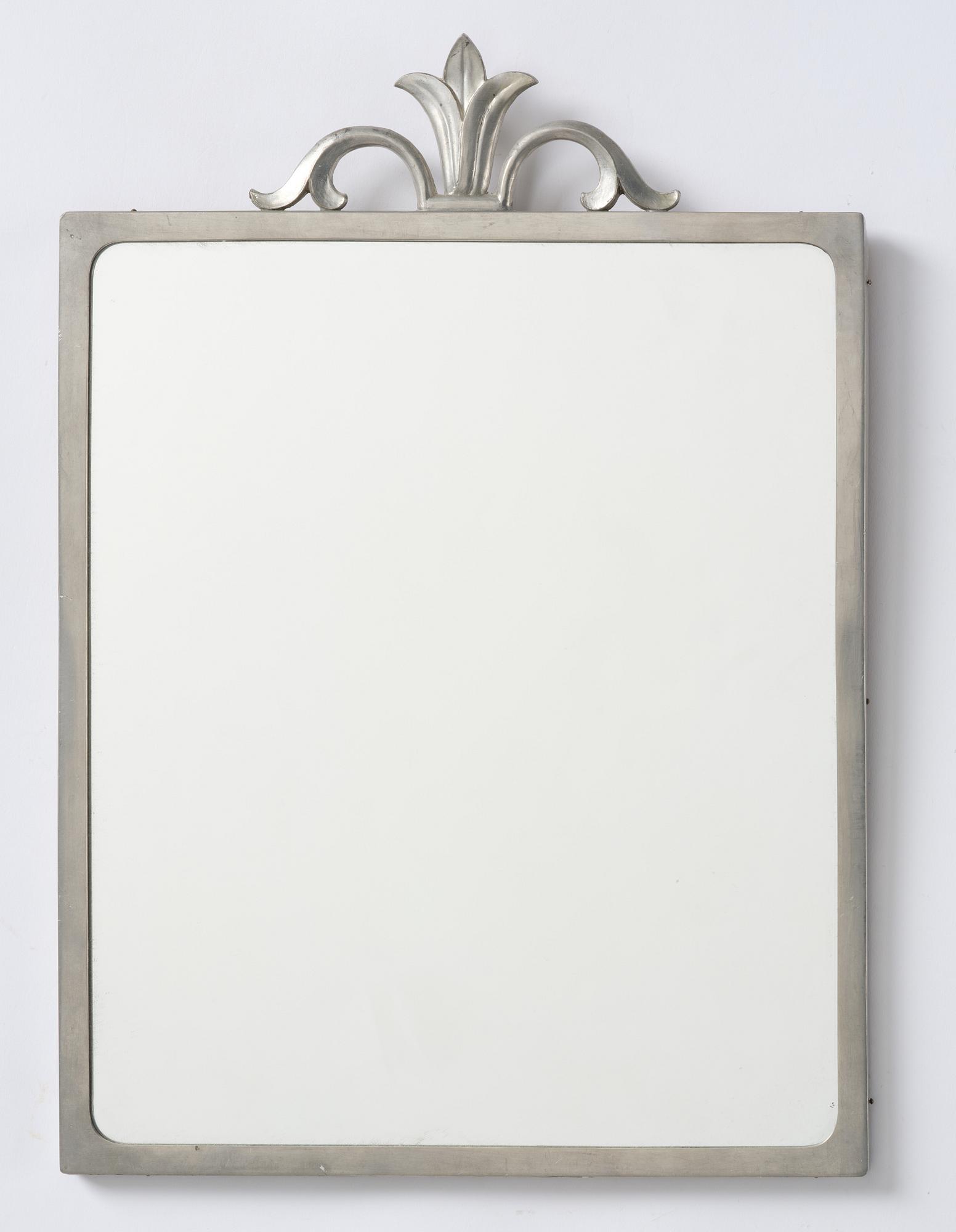 A Swedish Grace pewter mirror, Schreuder & Olsson AB, Stockholm, 1929.