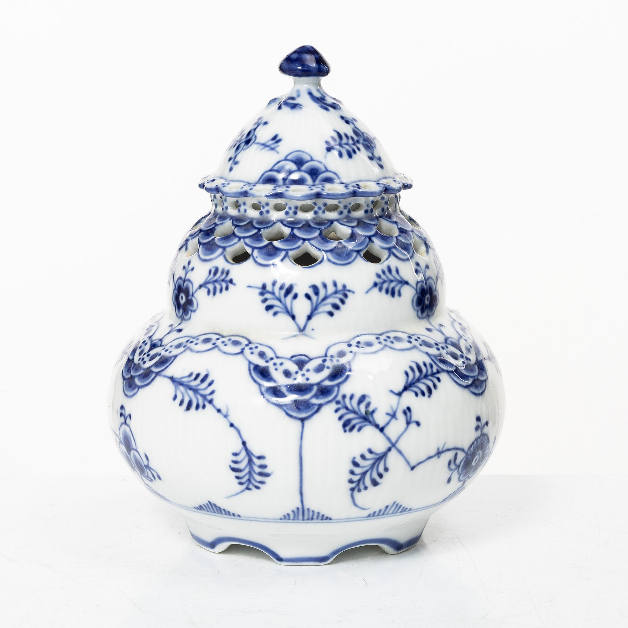 Royal Copenhagen, A 'Blue Fluted' full lace porcelain potpurri urn with cover, model 1/1186, Denmark, 1889-1922.