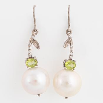 Cultured freshwater pearl, peridot and brilliant-cut diamond ring.
