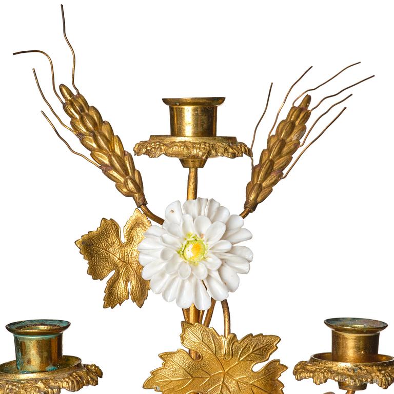 A contemporary five candle candelabrum.