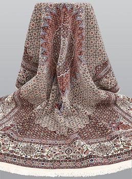 A part silk Moud carpet, approximately 350 x 252 cm.