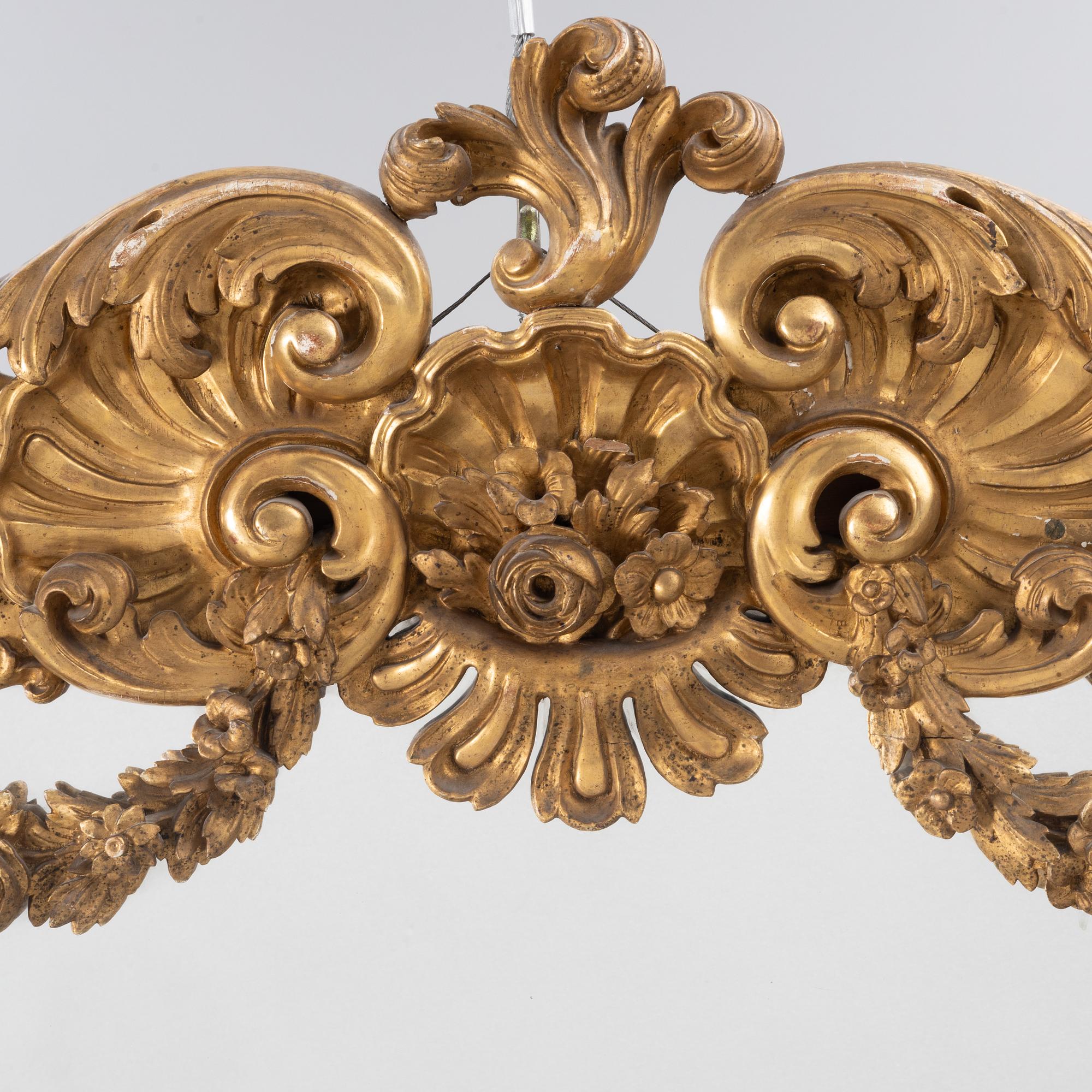 A Rococo style mirror, 19th Century.