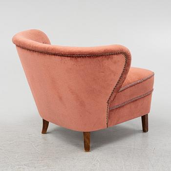 Swedish Modern, an armchair, 1940/50s, the model has been sold via Gösta Jonsson.