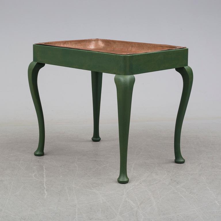 An early 20th century table by AB Nordiska Kompaniet.