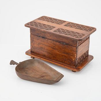 A carved wooden box, a ladle and three placques, Jakarta, Indonesia, 20th Century.