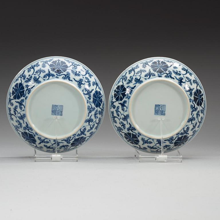 A pair of blue and white lotus dishes, Qing dynasty (1644-1912) with Qianlong seal mark.
