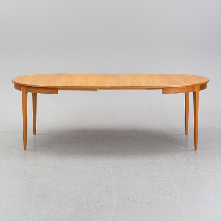 An oak dining table and four chairs by Carl Malmsten for Bodafors. Second half of the 20th Century.