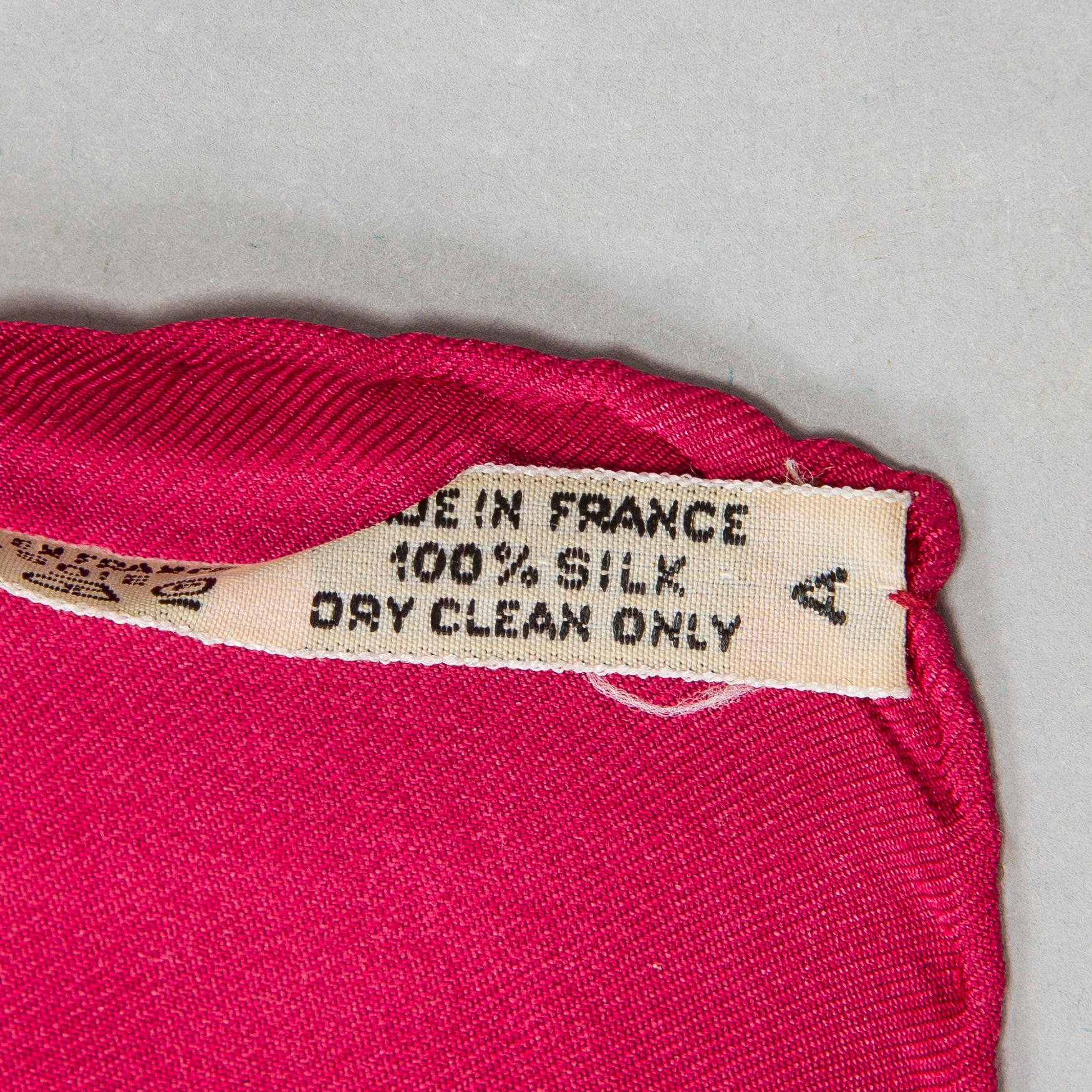 Hermès, a 'Les Rubans du Cheval' silk scarf.