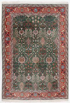 A semi-antique Tabriz carpet, North West Persia of Safavid 'Vase' design, c.  c. 291 x 202 cm.