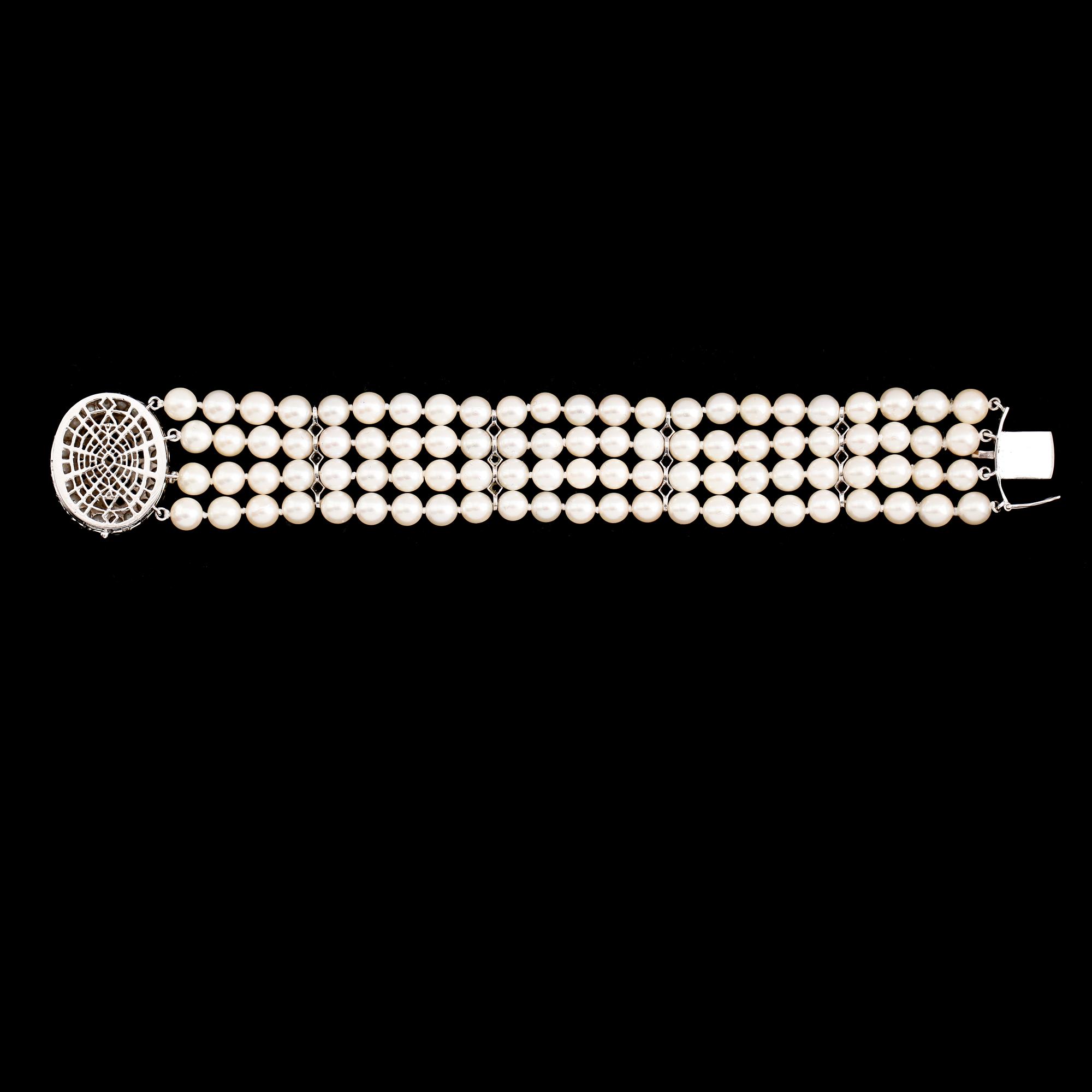 ARMBAND, 14 k vitguld, odlade pärlor, safirer tot ca 4.65 ct.