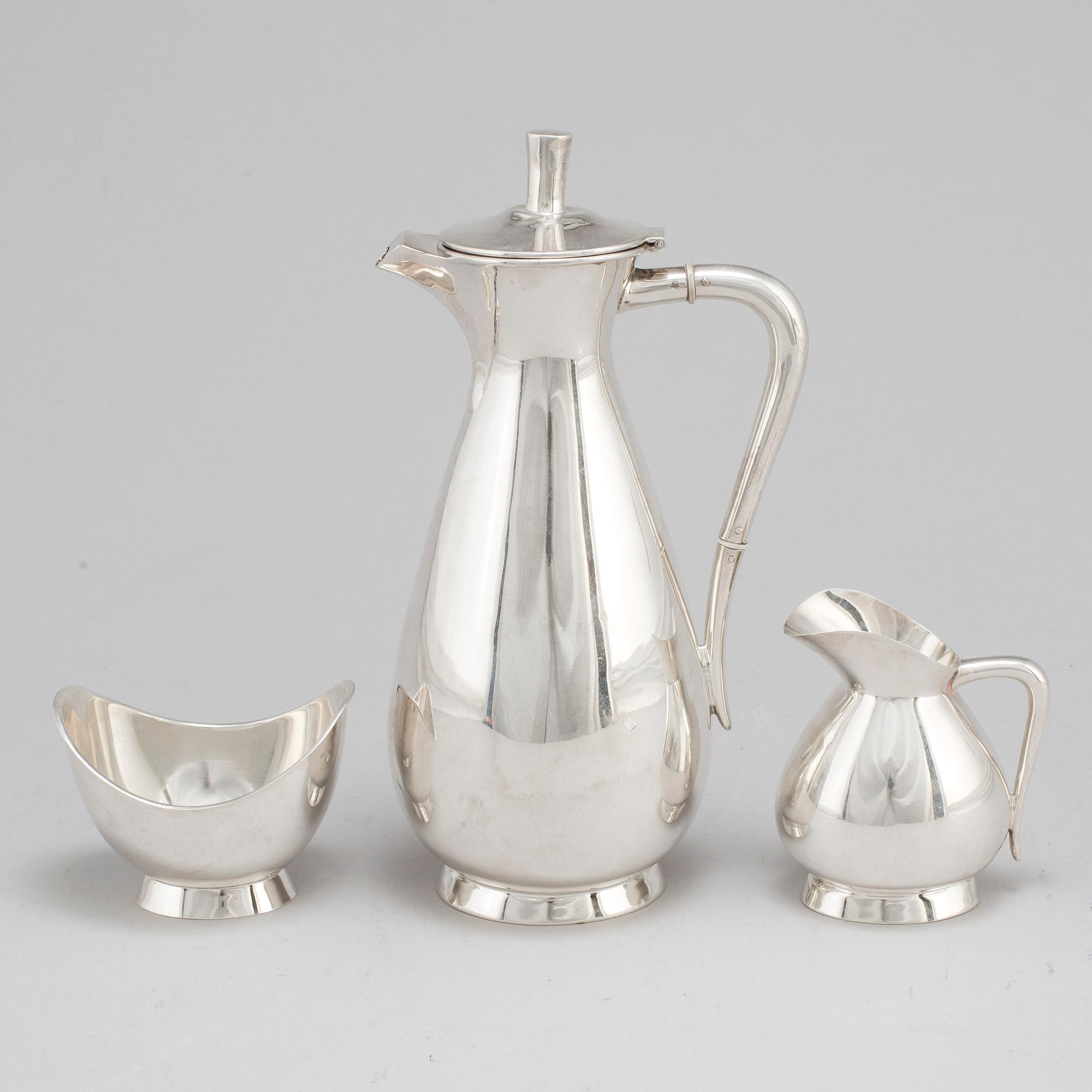 A three piece sterling silver coffee set, Germany. 20th century.