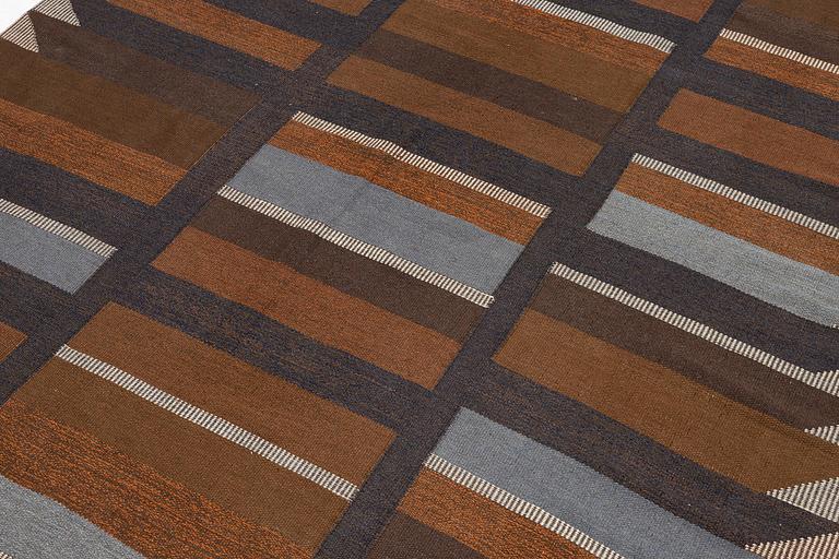 Margareta Grandin-Nettles, a flat weave carpet, c. 305 x 250 cm, signed GLH MG.