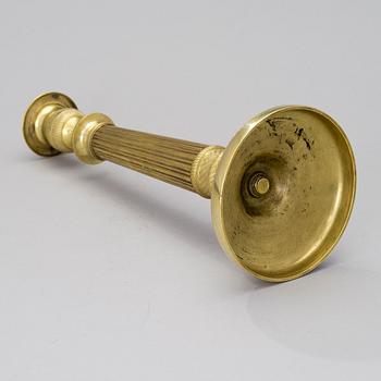 An early 19th century empire candlestick.