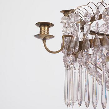 A Late Gustavian gilt brass and cut glass eight-light chandelier, circa 1800.