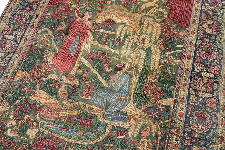 A semi-antique pictoral Kirman Lavar rug, Southeastern Persia (Iran), c. 236 x 156 cm.
