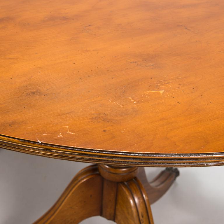 A 20th century English style dining table.
