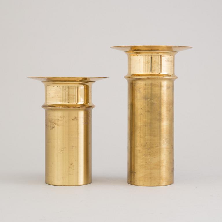 TAPIO WIRKKALA, a pair of brass candlesticks from Kultakeskus Oy, Finland.