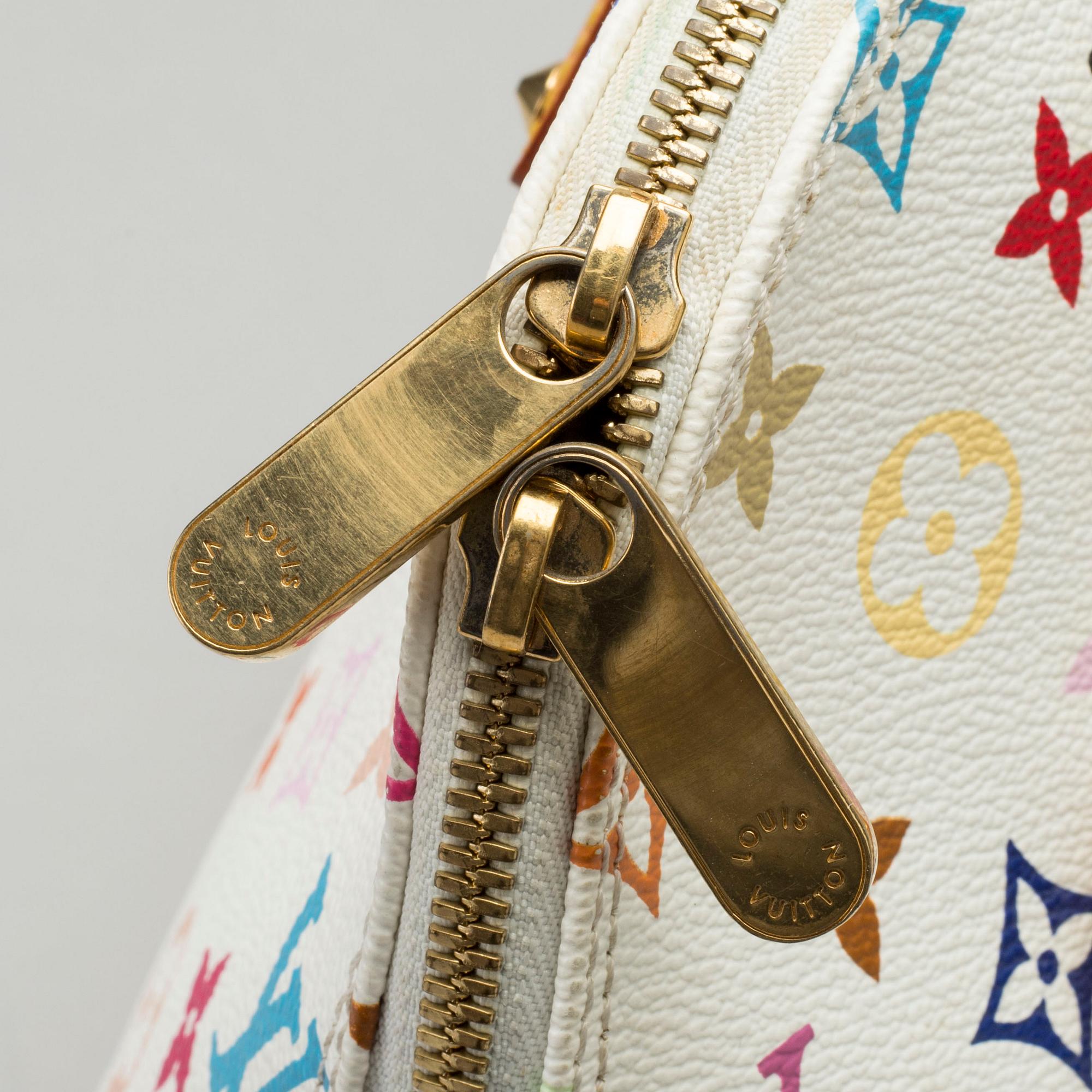 A LOUIS VUITTON ALMA BAG.