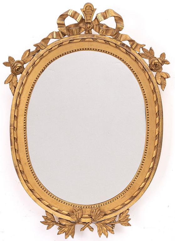 A Gustavian style mirror, early 20th century.