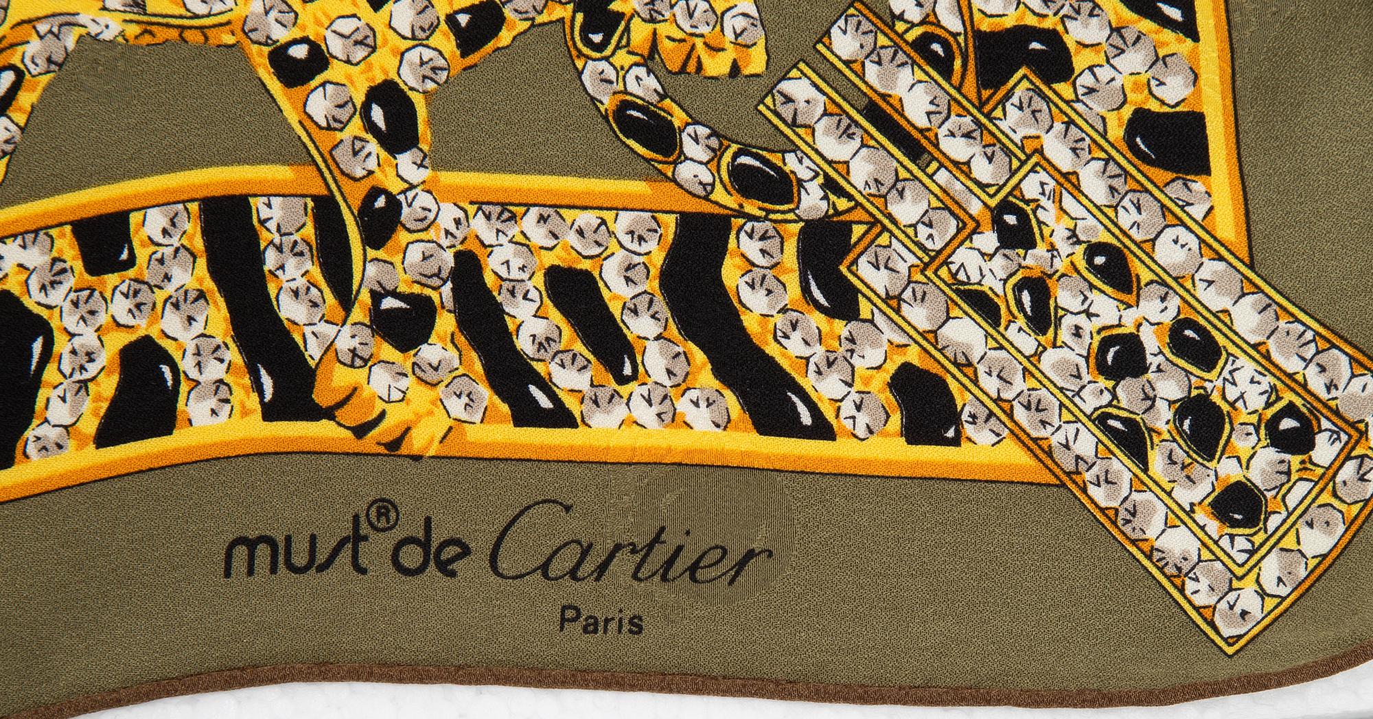 Cartier, a jaquard silk scarf.