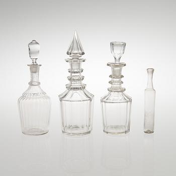 Three carafes and a glass bottle from the end of the 19th century.