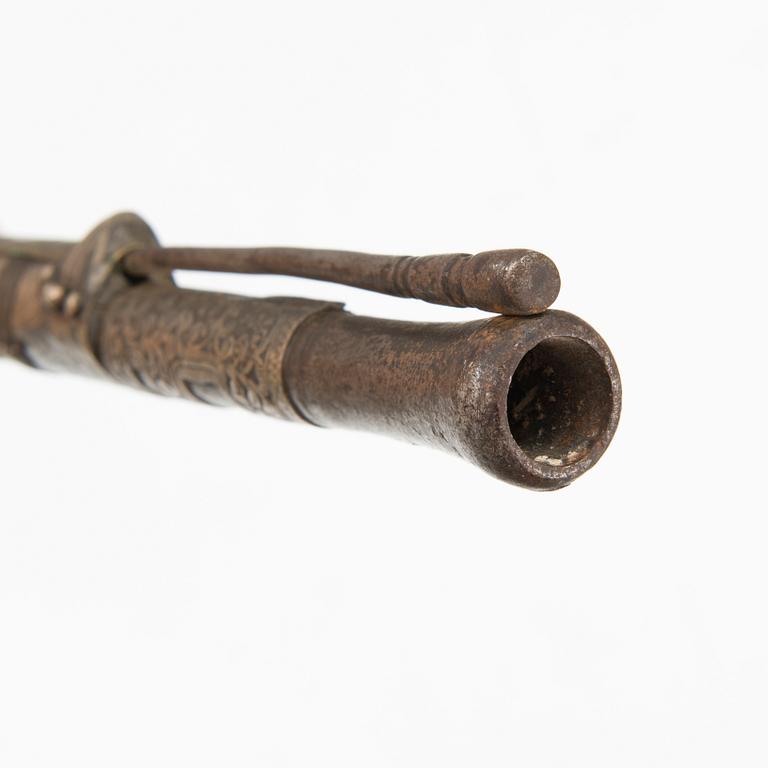 A 19th Century North African flint lock rifle.